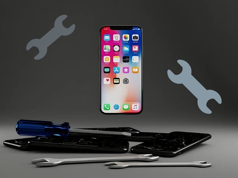 Réparation téléphone – Techni’phone Valence Téléphone en réparation avec outils, symbolisant les services de Techni'phone à Valence et Guilherand-Granges.